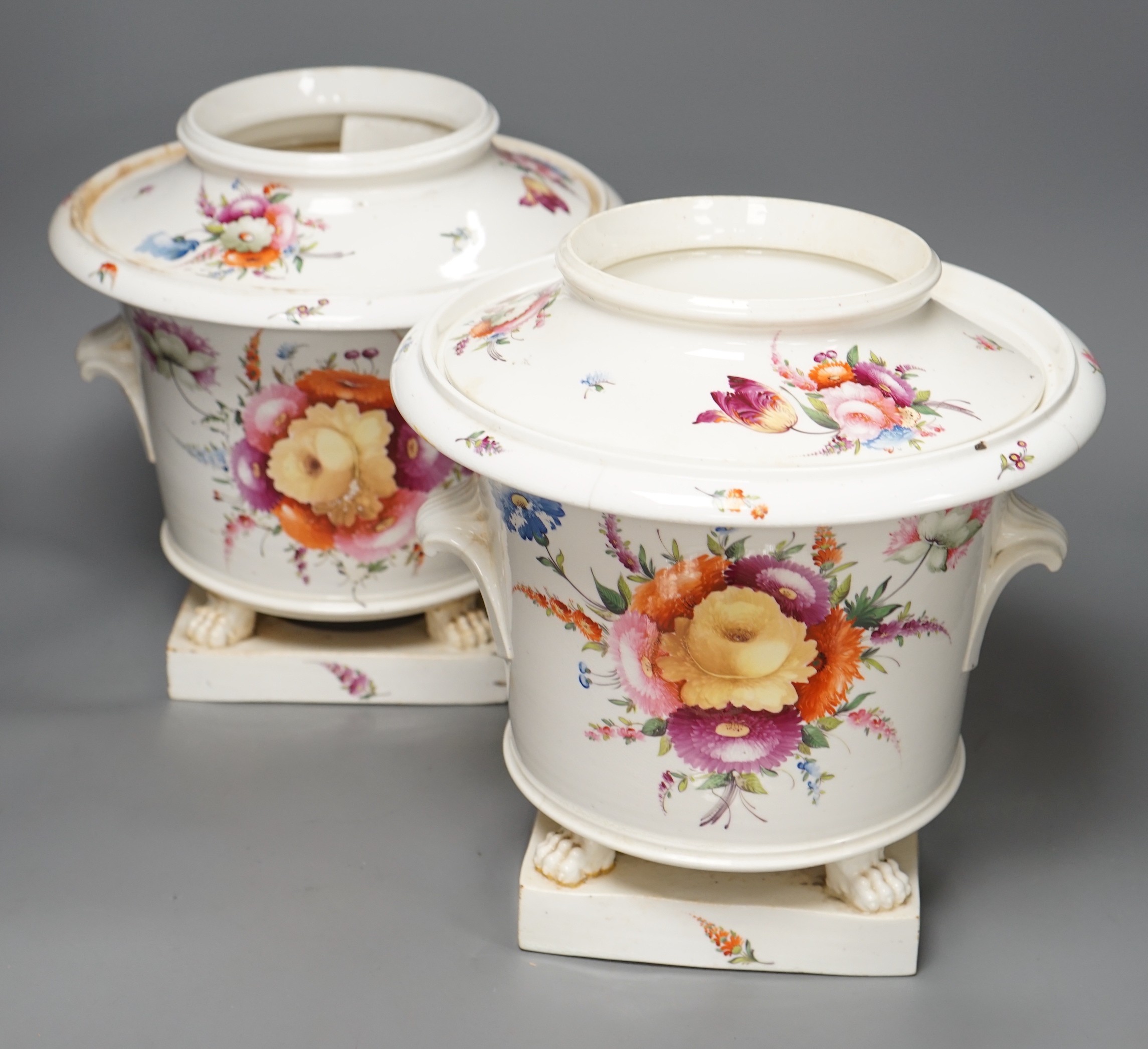 A pair of early 19th century Coalport floral painted ice pails, 29cm